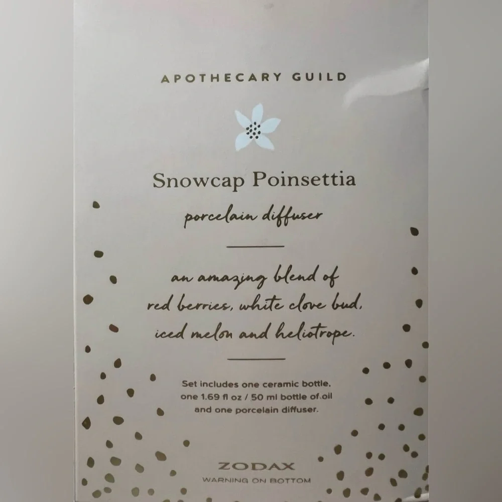 Zodax- Snowcap Poinsettia Porcelain Diffuser - Gold